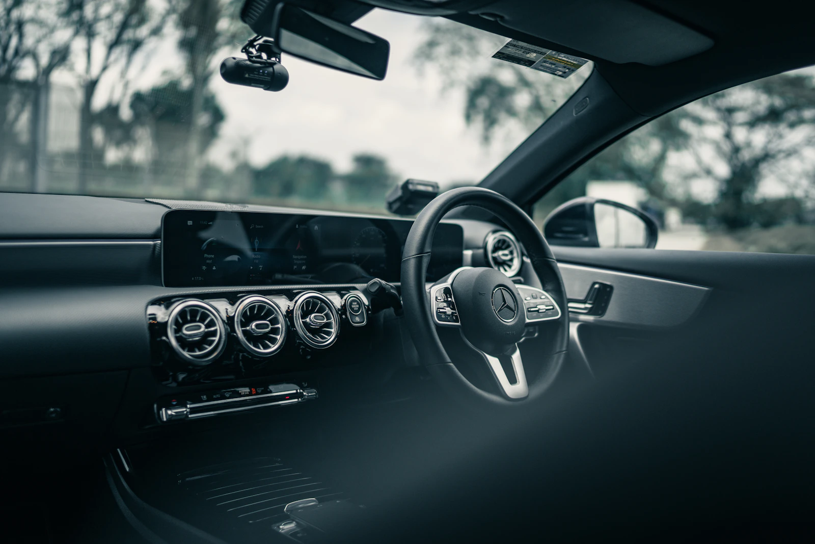 Car interior inspiration featuring a dashboard, screen and steering wheel